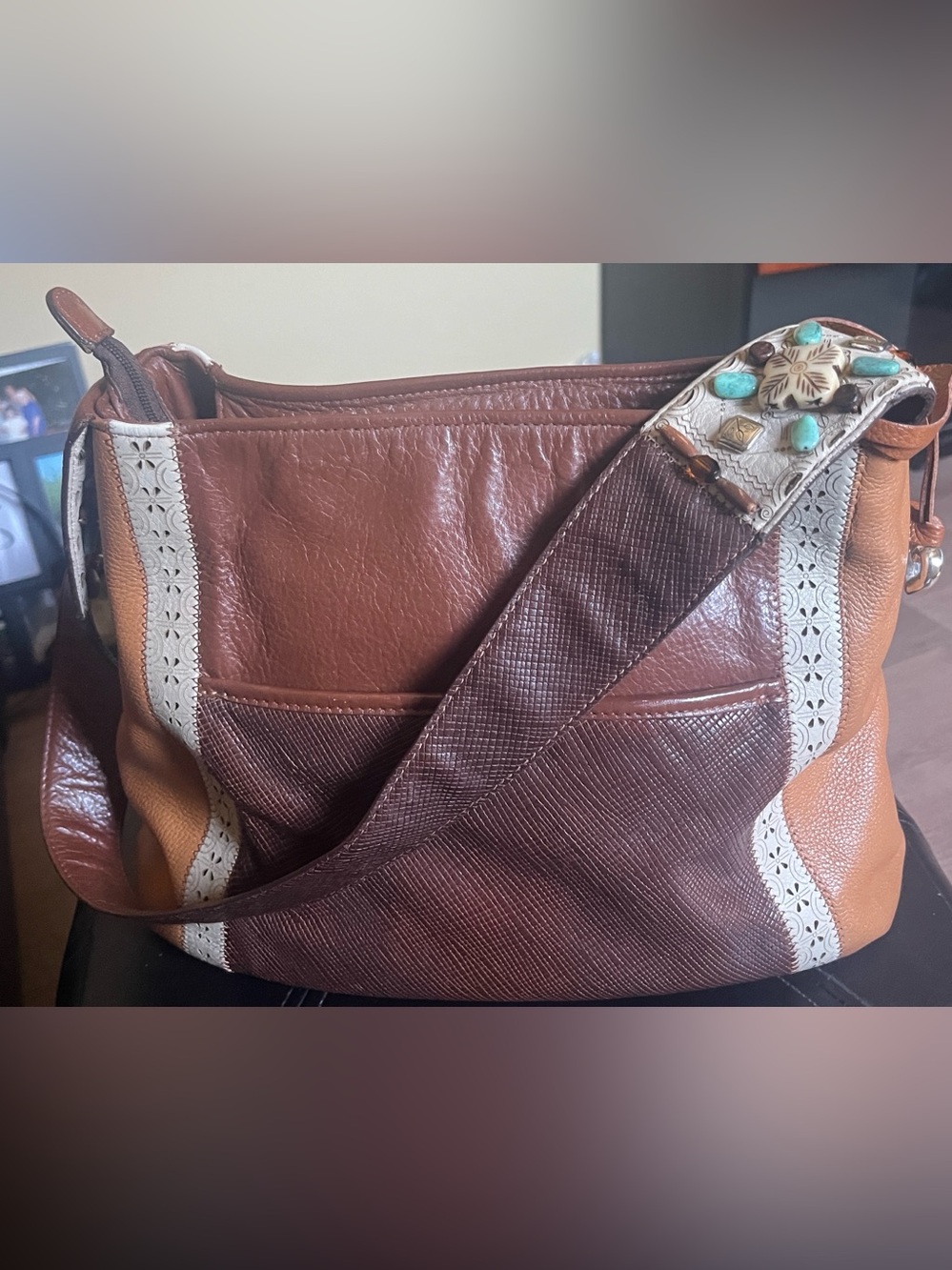 Like new Brown Leather tote with beautiful beaded strap work.